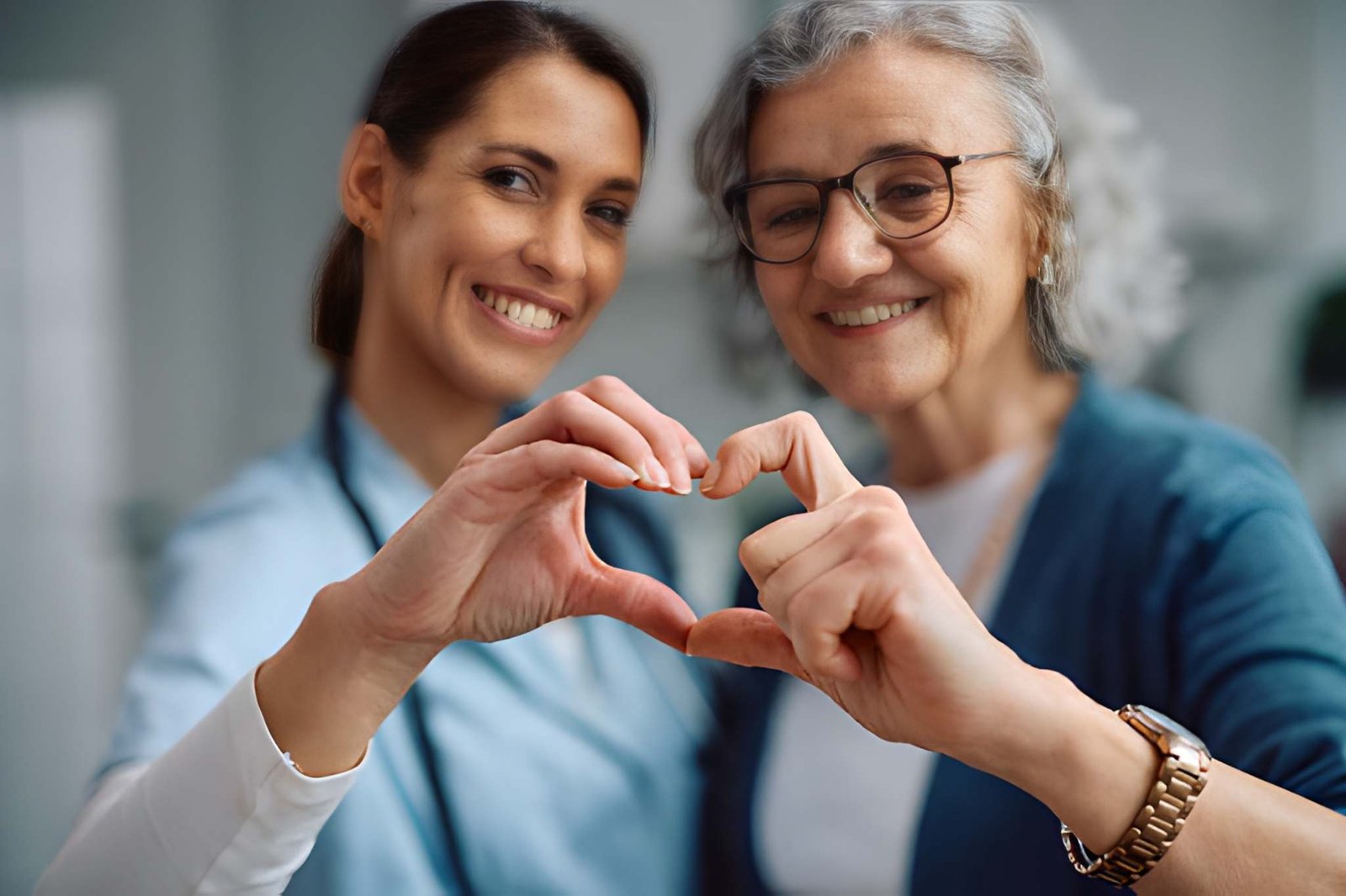 Caregiver and older adult sharing a warm moment