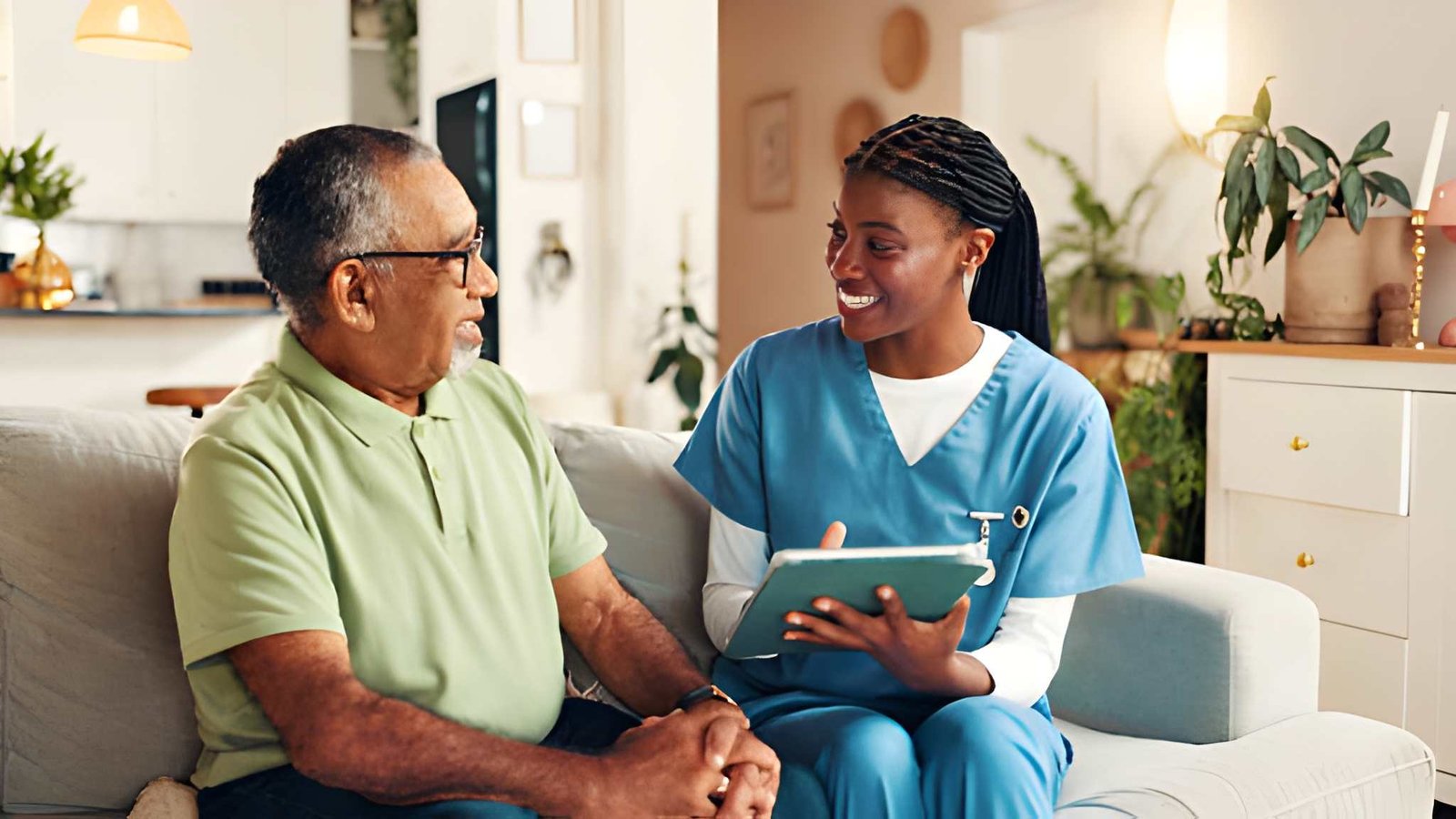 Caregiver talking with an older adult at home